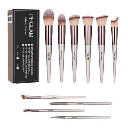 Set of makeup brushes with PHGLAM packaging on a white background