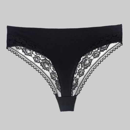 Black lace-trimmed underwear on a white background