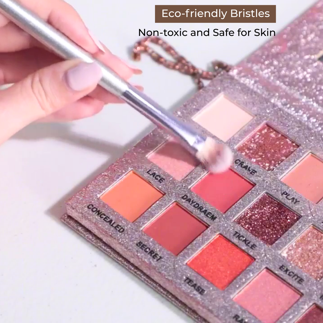 Makeup palette with a brush applying cream, labeled 'Eco-friendly Bristles Non-toxic and Safe for Skin'.