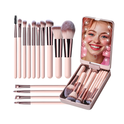 Set of makeup brushes with a mirror case on a white background