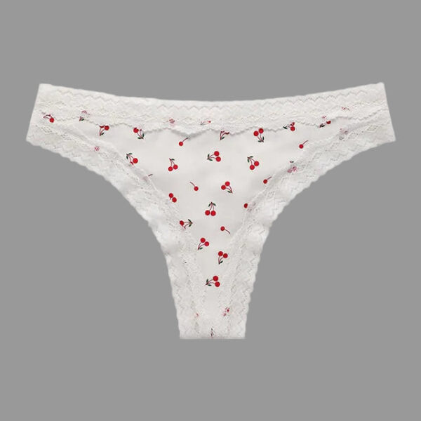 White lace thong with red cherry pattern on a white background