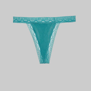 Teal lace thong on a white background