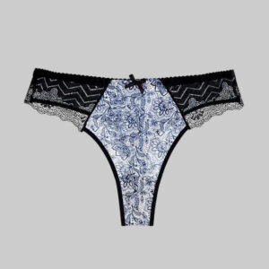 Patterned underwear with black lace trim on a white background
